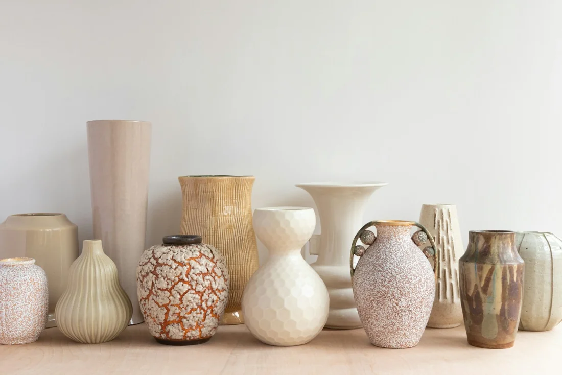 A collection of ceramic vessels arranged side by side